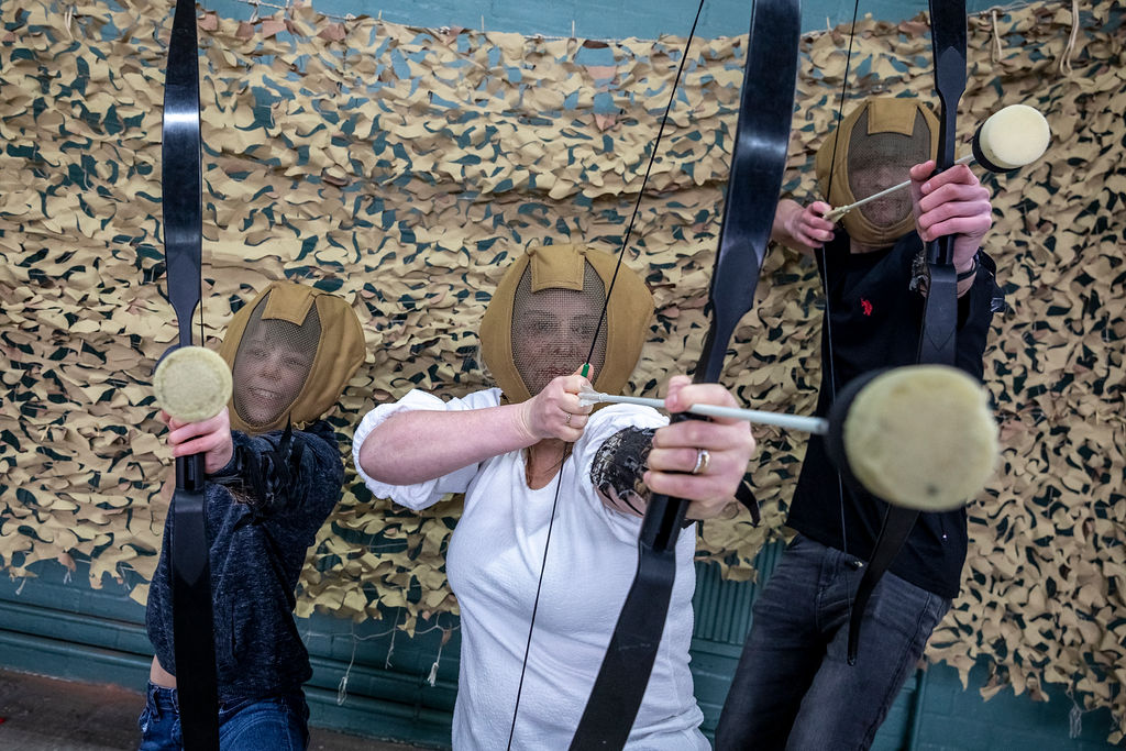 Visitors completing Archery Wars at Shrewsbury Prison