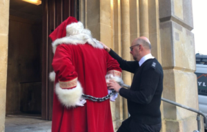 An officer locking Santa up in Shrewsbury Prison.